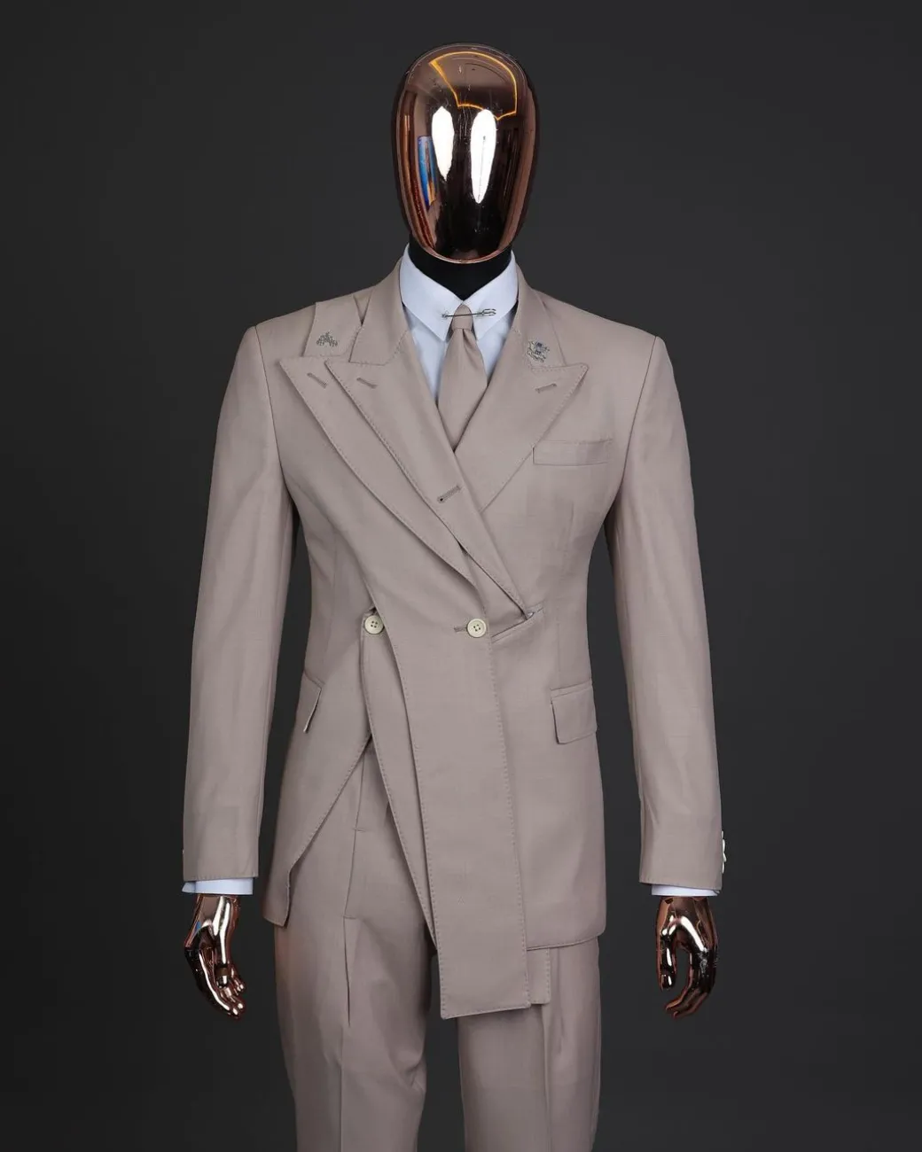 A “Yohji”, 2 buttons, Irish cream, deconstructed 3-layered knitted peak lapel suit