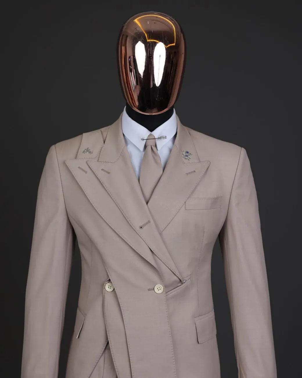 A “Yohji”, 2 buttons, Irish cream, deconstructed 3-layered knitted peak lapel suit