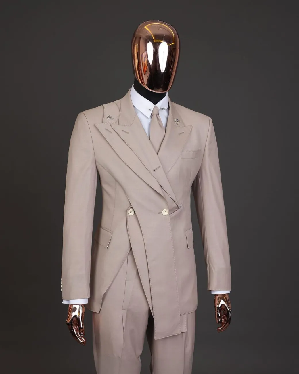 A “Yohji”, 2 buttons, Irish cream, deconstructed 3-layered knitted peak lapel suit