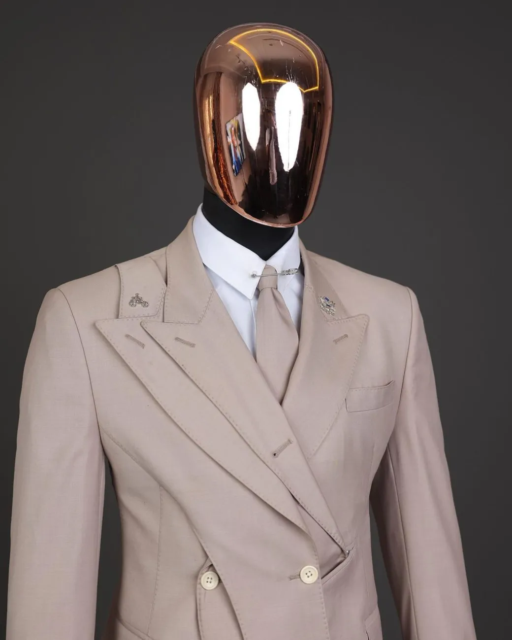 A “Yohji”, 2 buttons, Irish cream, deconstructed 3-layered knitted peak lapel suit