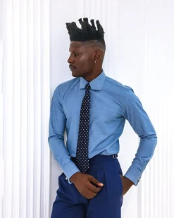 A Zero Pressure, Navy Blue shirt.
