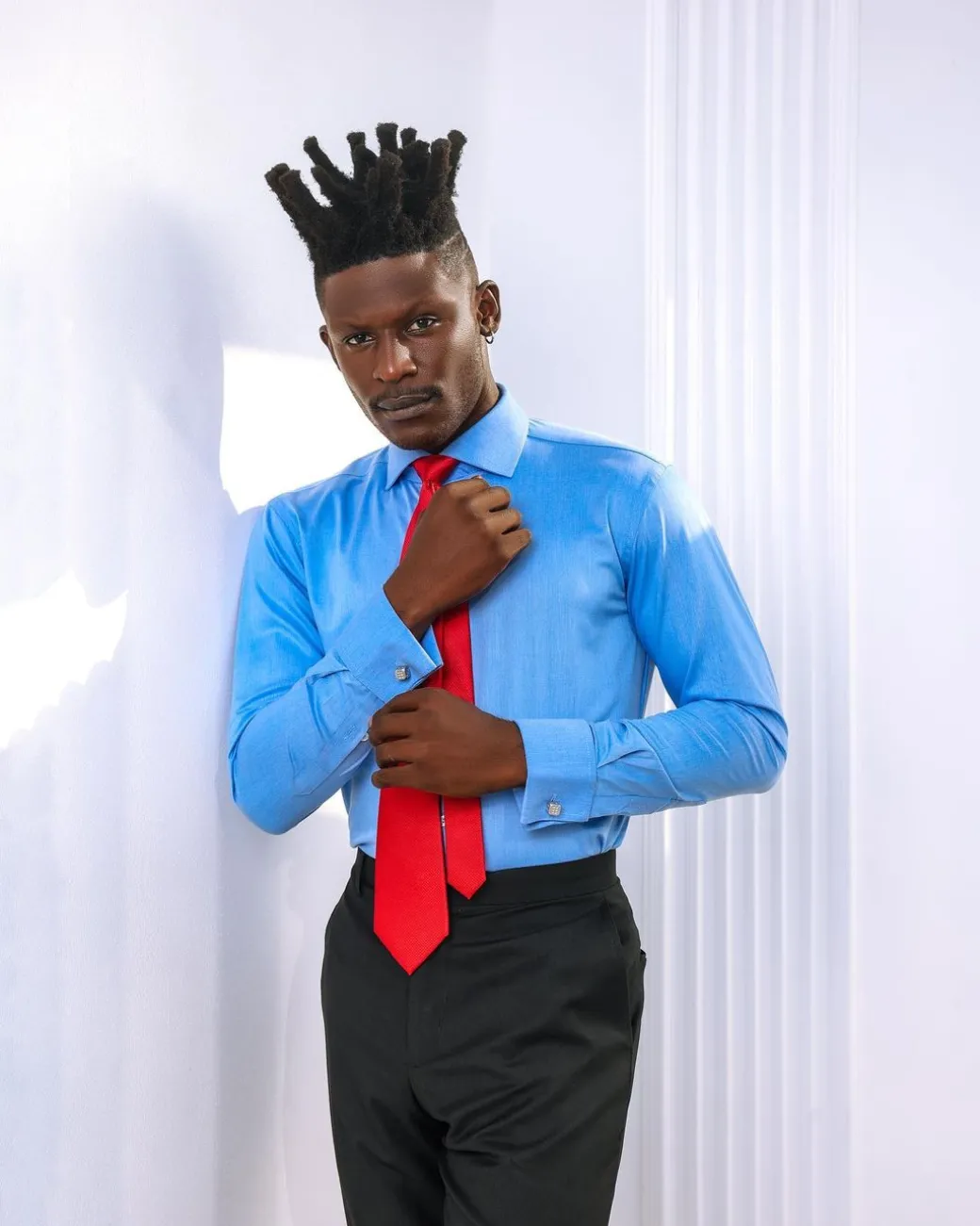 A Zero Pressure, Navy Blue shirt.