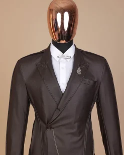 A #Herd” brown leather, knitted & outer layered peak lapel wrap suit