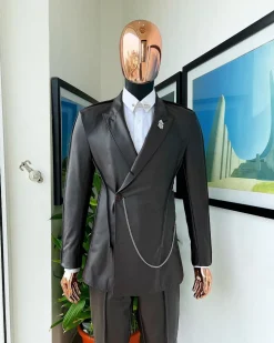 A #Herd” brown leather, knitted & outer layered peak lapel wrap suit