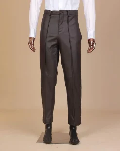 A #Herd” brown leather, knitted & outer layered peak lapel wrap suit