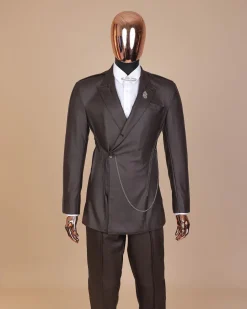 A #Herd” brown leather, knitted & outer layered peak lapel wrap suit