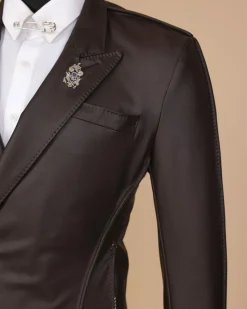 A #Herd” brown leather, knitted & outer layered peak lapel wrap suit