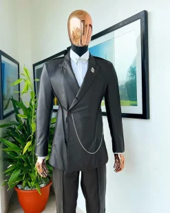 A #Herd” brown leather, knitted & outer layered peak lapel wrap suit