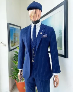An Admiral and Skye blue pinstripe “peaky blinders” Jorgecarli Super 140’s “Board Room” notch lapel suit