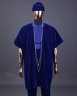 An Admiral blue daftan, sokoto & Fila Yoruba African native.