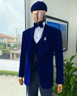 An admiral blue “peaky blinders” soaked Italian velvet shawl lapel suit