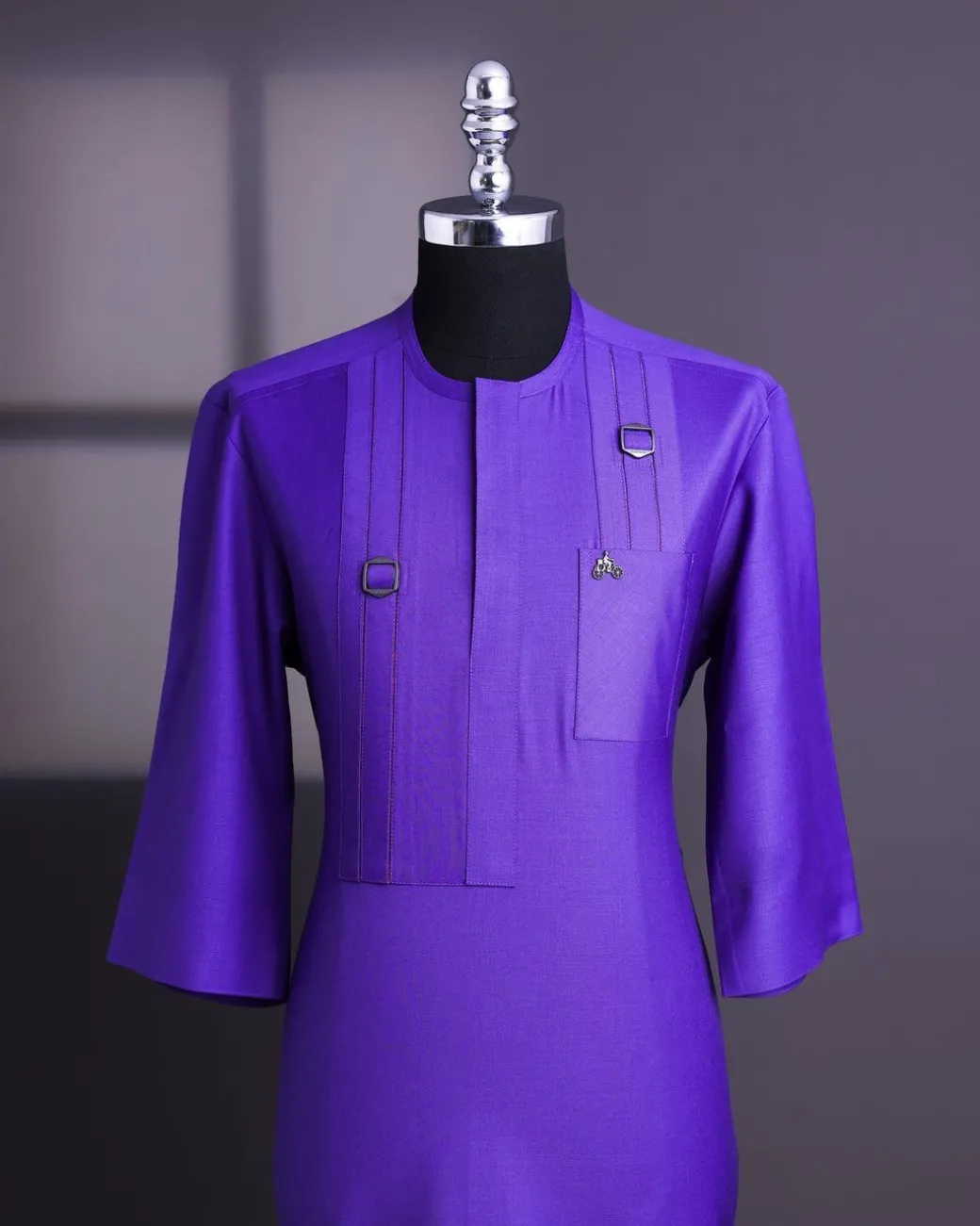An Aesthetic purple, lengthened rectangle double side flap, 3/4 sleeve with paisley details traditional African senator kaftan native.