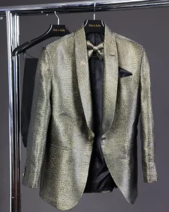 An “alligator” patterned gold metallic jacquard tuxedo suit