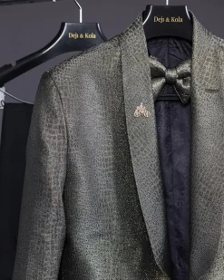 An “alligator” patterned gold metallic jacquard tuxedo suit