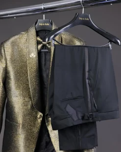 An “alligator” patterned gold metallic jacquard tuxedo suit