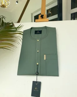 An Aqua green front flap African kaftan with Swarovski button and Sokoto