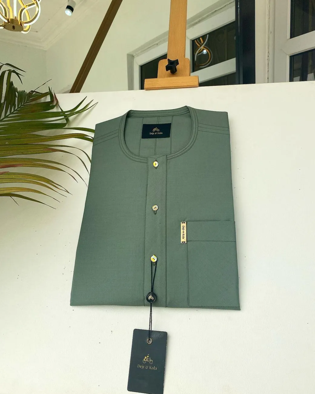 An Aqua green front flap African kaftan with Swarovski button and Sokoto