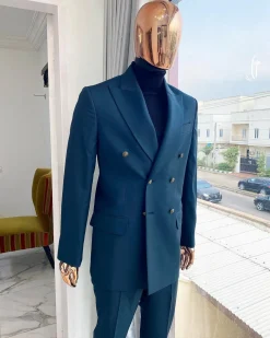 An Army green double-breasted peak lapel suit