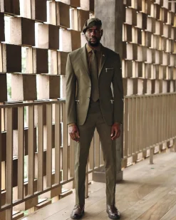 An Army Green Monochrome “Junta” Notch Lapel Suit With Patch Pocket Zip Detailing & Gurkha Pant Trousers.