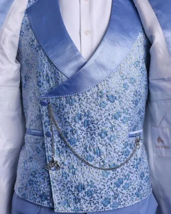 An Azure blue, knitted, star studded metallic jacquard, shawl lapel tuxedo suit.