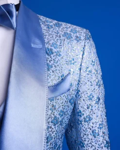 An Azure blue, knitted, star studded metallic jacquard, shawl lapel tuxedo suit.