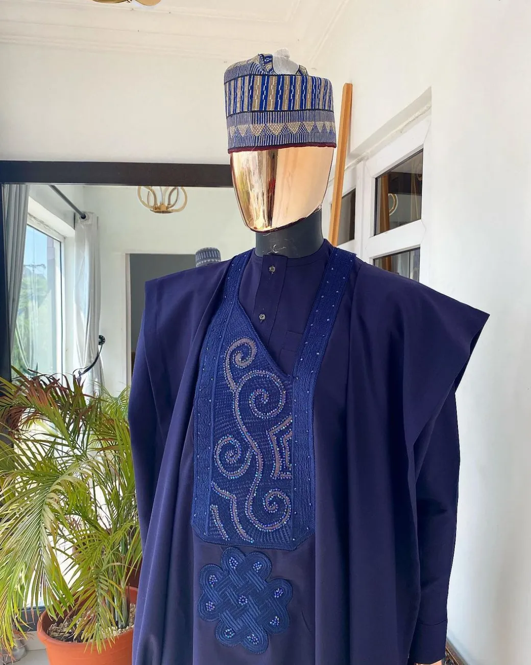 An Egg plant Purple and Blue Embroidery African tailored Agbada