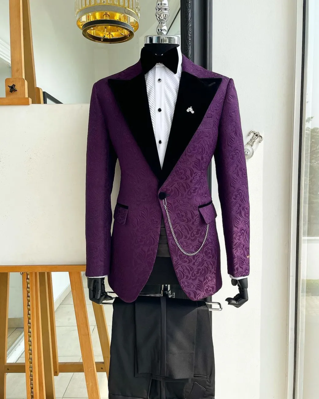 An Egg plant purple, peak lapel, floral patterned jacquard tuxedo suit