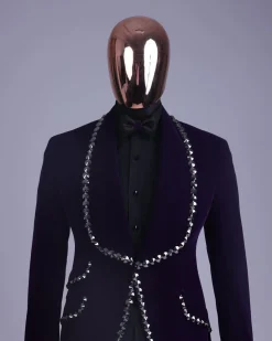 An egg plant purple velvet shawl lapel tuxedo suit, laced with jet hematite Swarovski stones