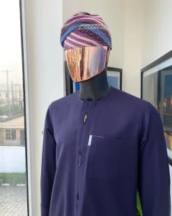 An eggplant purple flap with paisley lining details, African traditional senator kaftan native