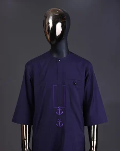 An eggplant purple, front flap with black Swarovski button, square and anchor embroidery detailing kaftan and Sokoto