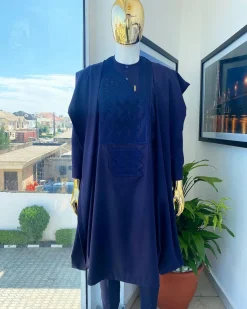 An eggplant purple, wavy level, zigzag embroidery agbada