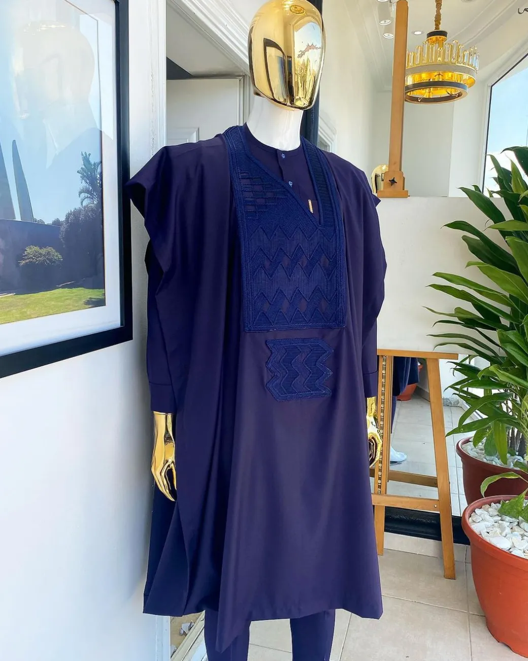 An eggplant purple, wavy level, zigzag embroidery agbada