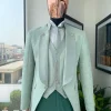 An “eloper” Pistachio green, floral pattern jacquard tuxedo suit