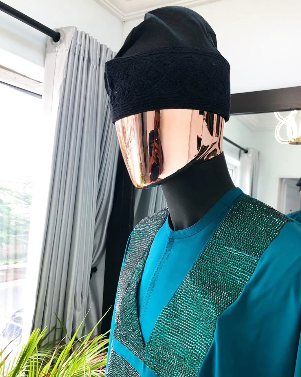 An Emerald Green Agbada with Swarovski Stone Embroidery