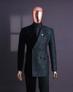 An Emerald green & black “rival” 1/4 cut ocean element peak lapel double breasted jacquard suit