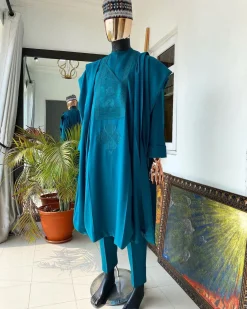 An Emerald Green embroidery Agbada with buba and Sokoto