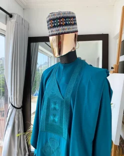 An Emerald Green embroidery Agbada with buba and Sokoto