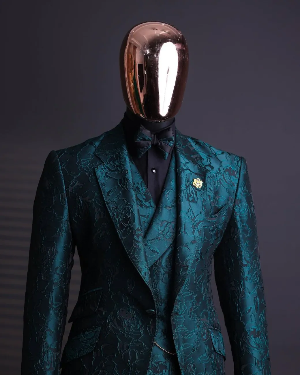 An Emerald green, knitted, root floral jacquard notch lapel suit