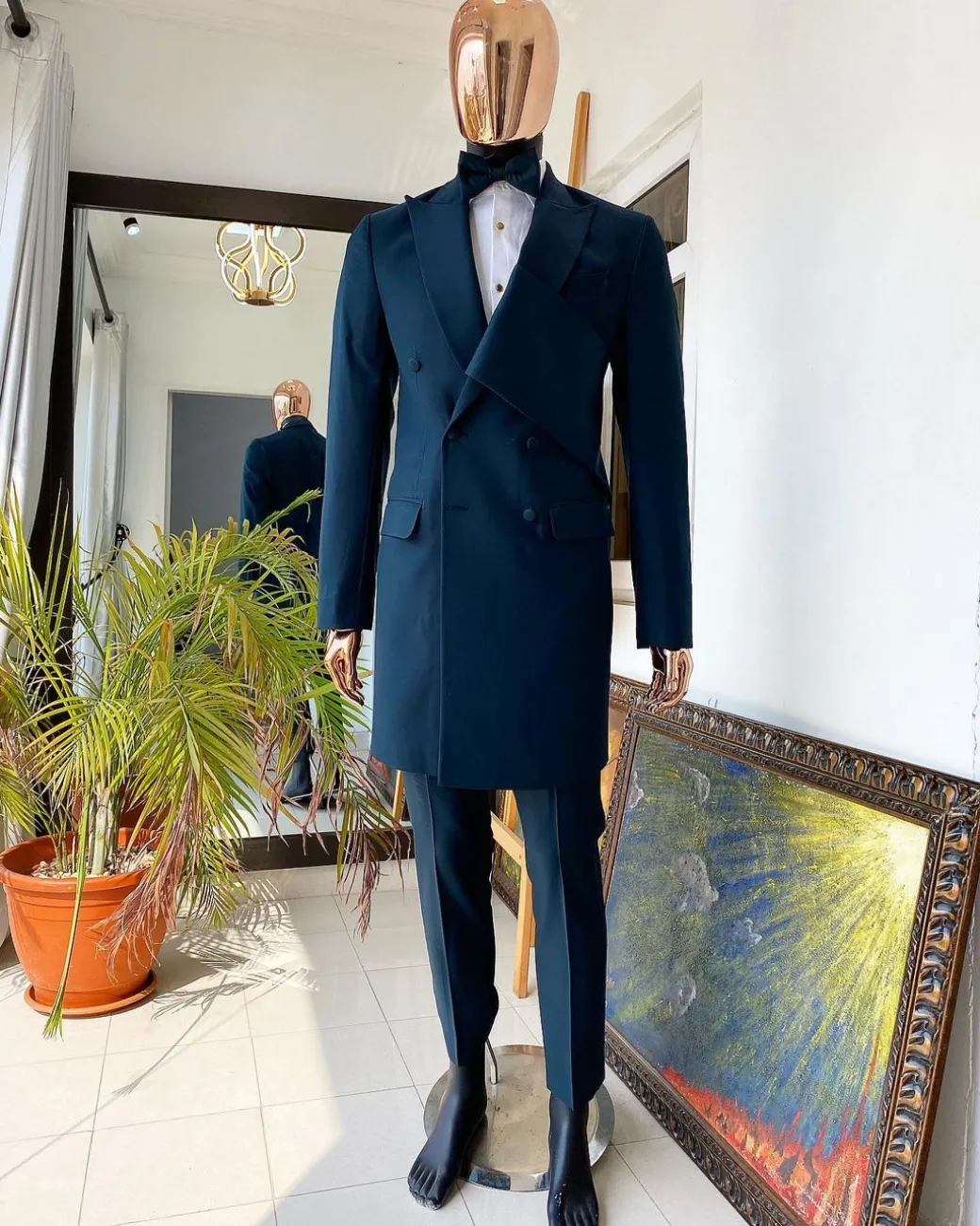 An Emerald green “Oranmiyan” trench blazer suit