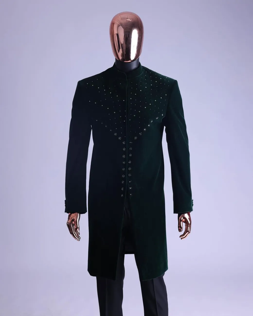 An Emerald Green Safari Suit With Mixed Swarovski Stones Detailing