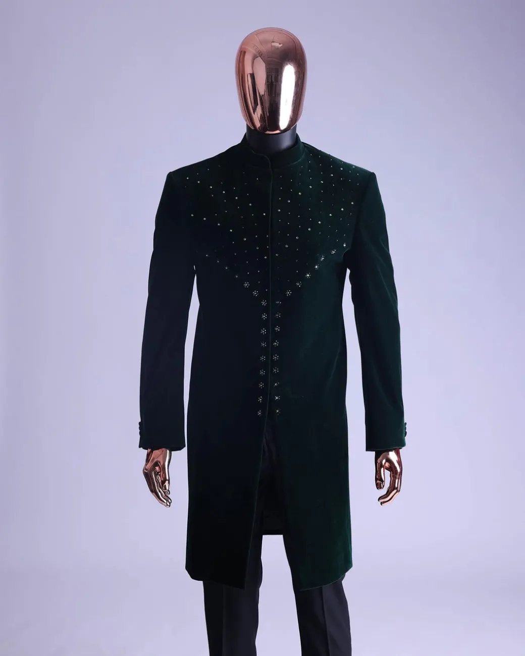 An Emerald Green Safari Suit With Mixed Swarovski Stones Detailing