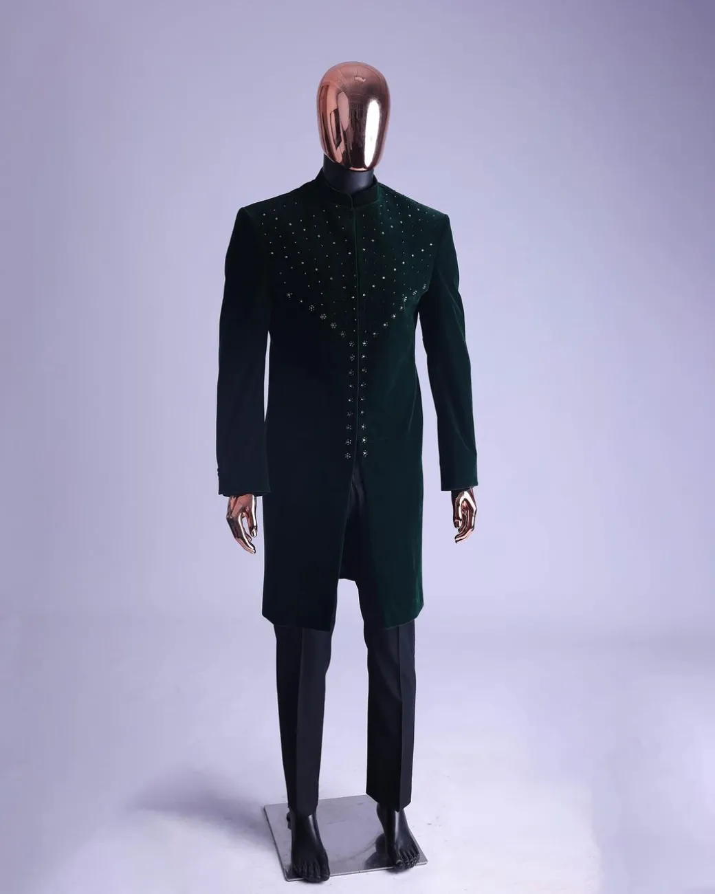 An Emerald Green Safari Suit With Mixed Swarovski Stones Detailing