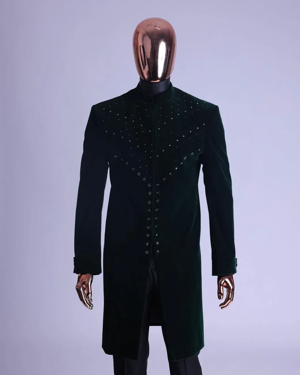 An Emerald Green Safari Suit With Mixed Swarovski Stones Detailing