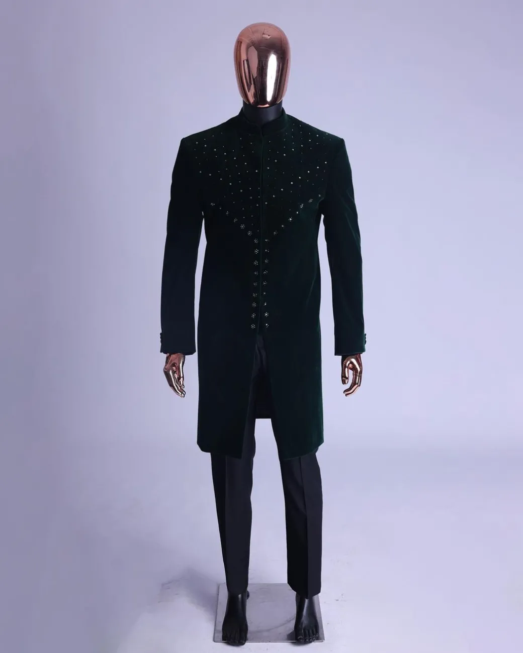 An Emerald Green Safari Suit With Mixed Swarovski Stones Detailing
