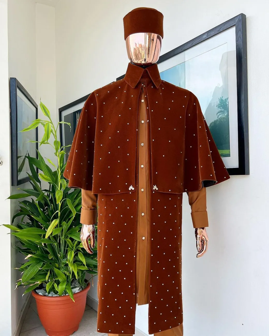 An “Eyes Wide Shut” syrup brown Italian velvet Ceremonial suktan with gold crystals Swarovski stone