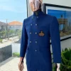 An Indigo and azure blue shepherd’s check “preacher” double breasted safari suit