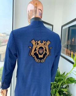 An Indigo and azure blue shepherd’s check “preacher” double breasted safari suit