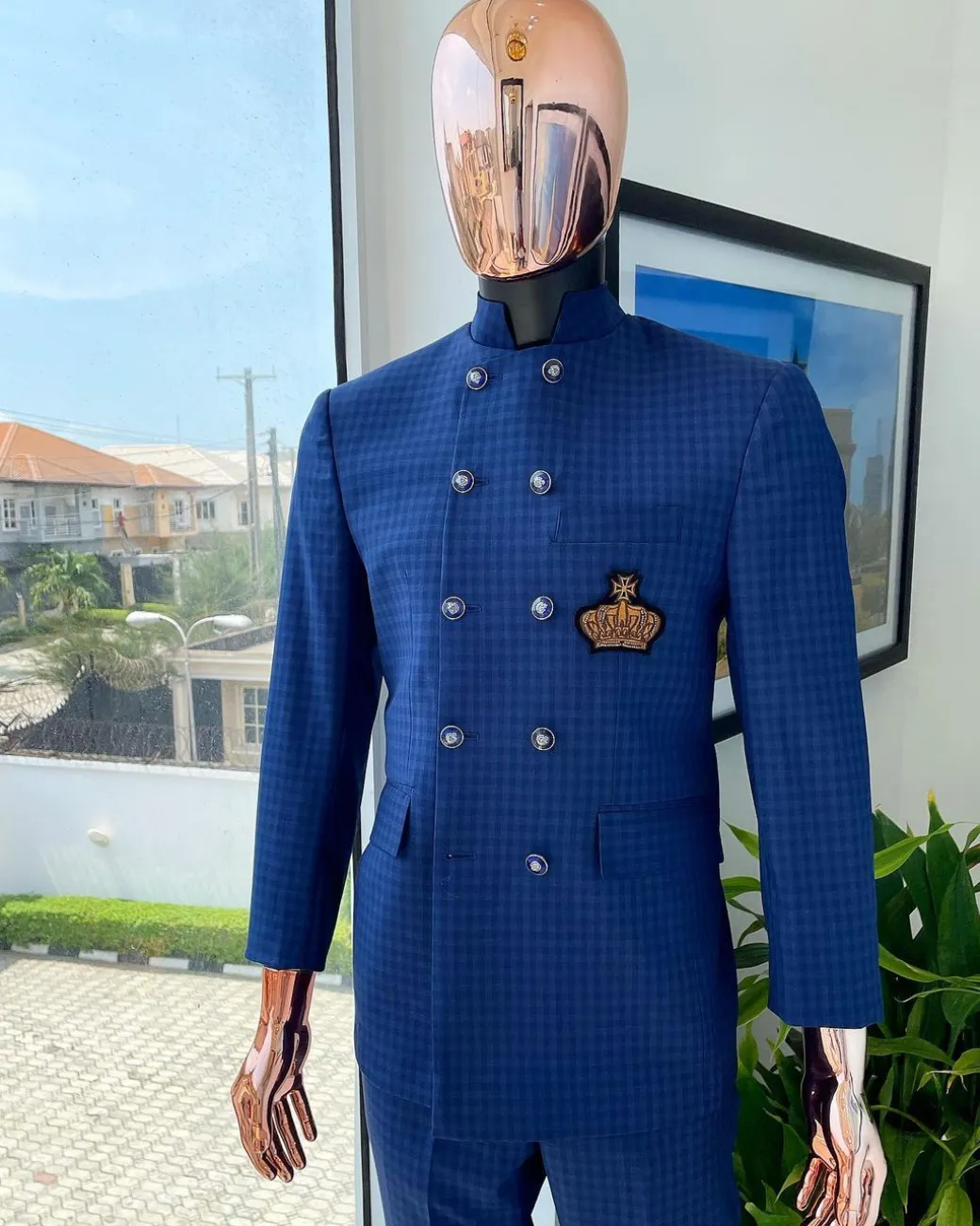 An Indigo and azure blue shepherd’s check “preacher” double breasted safari suit