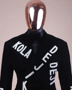 An “inscribe” your name charcoal black soaked velvet peak lapel wrap tuxedo suit