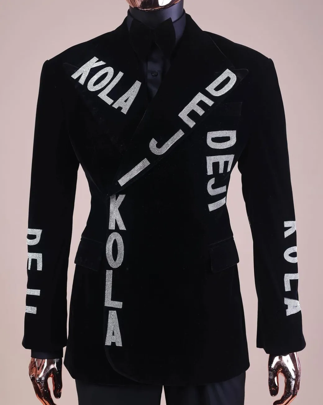 An “inscribe” your name charcoal black soaked velvet peak lapel wrap tuxedo suit